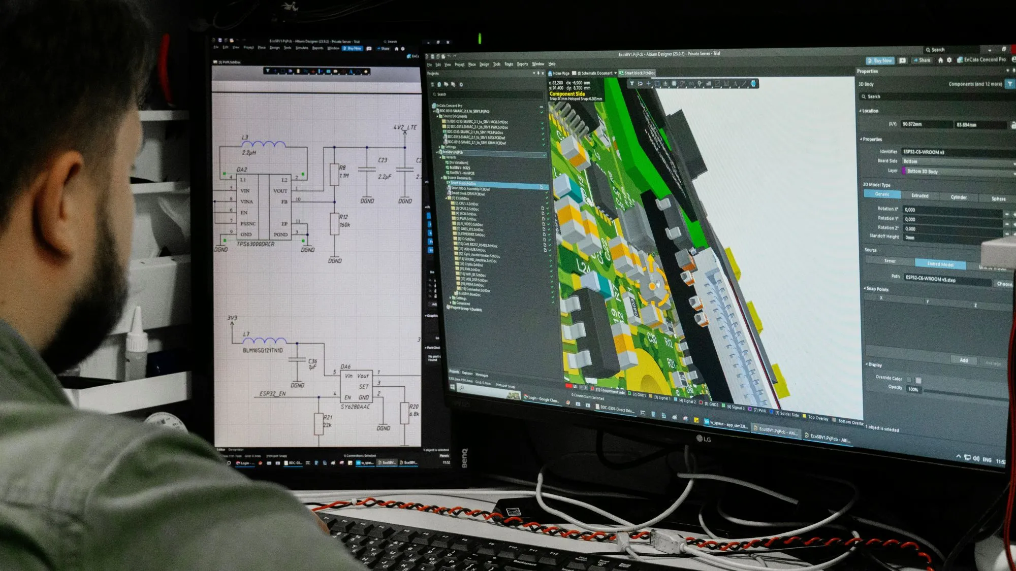 Engineer designing an RBK circuit board, with the schematic and 3D PCB layout on screen